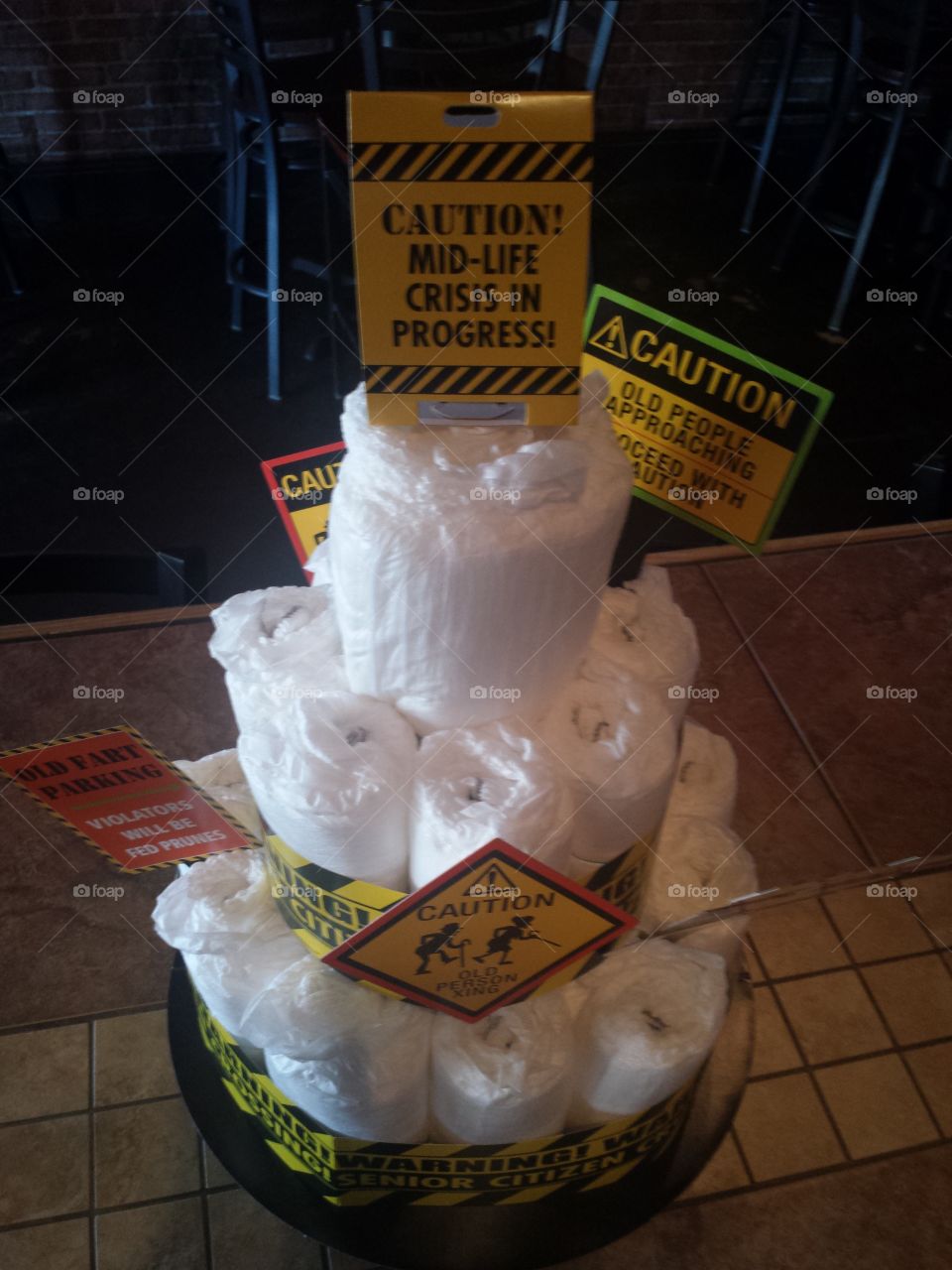 Caution sign with stack of papers