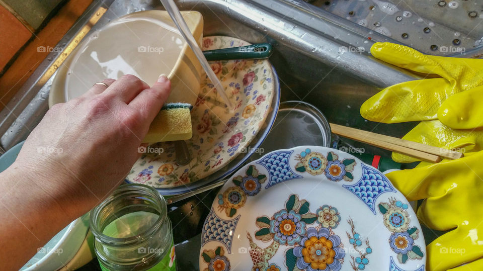 Washing the dishes after all that cooking...