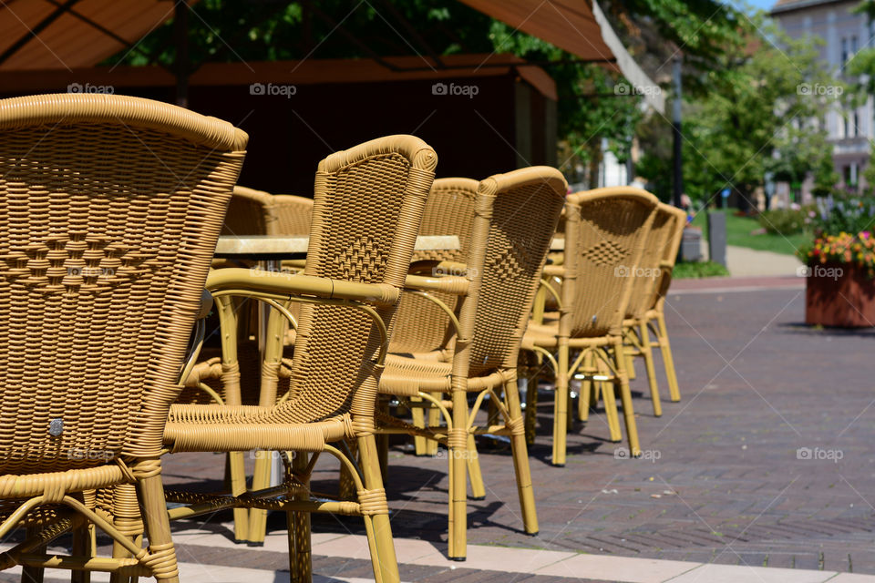 Knitted bamboo chairs. Restaurant chair made of bamboo in cite center Szeged Hungary