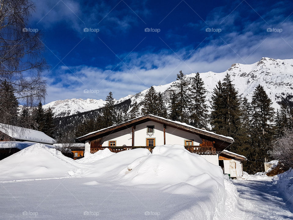 a cottage in the snowy mountains in Austria