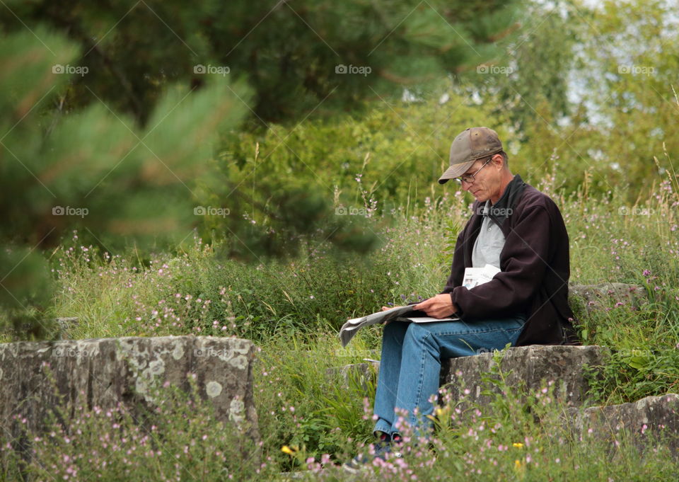 Man Reading Newspaper