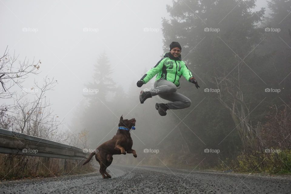 Jump#human#dog#road