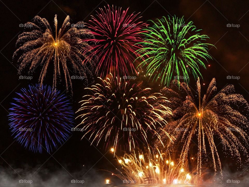 Fireworks display. Multicolored fireworks display
