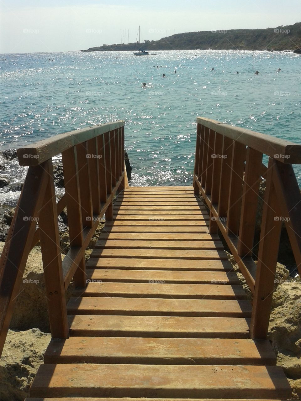 bridge to the ocean. end of a dock in Cyprus