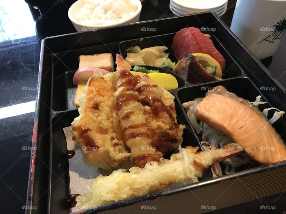 Bento box with tempura and salmon