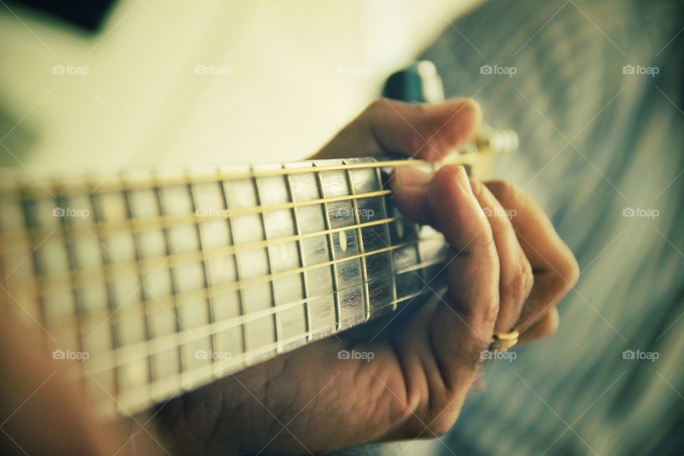 Playing a guitar creates an amazing atmosphere around you. It's so soothing to listen to the musical tunes.