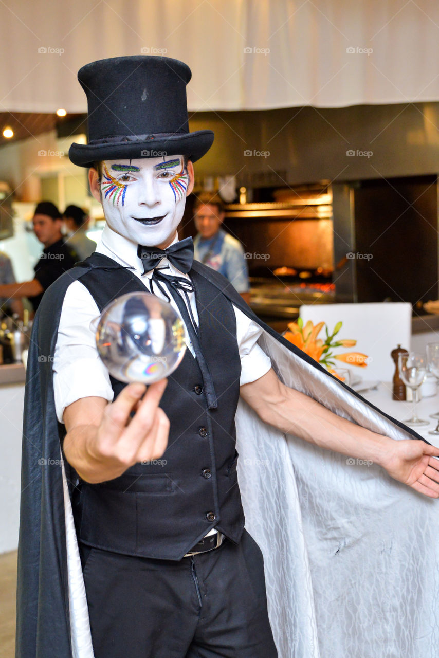 Magician with a crystal ball