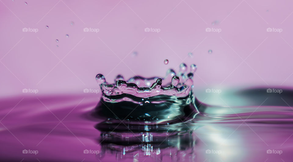 Detail of drops falling in water