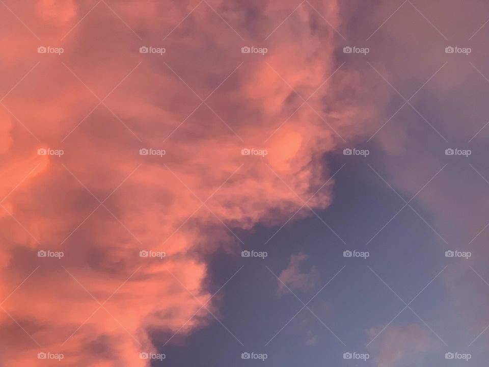 Unusual fluffy orange clouds.