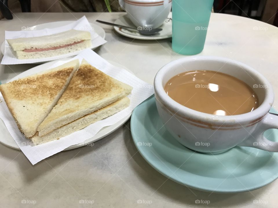 Hong Kong traditional cafe, milk tea and Ham sandwich, toasts 