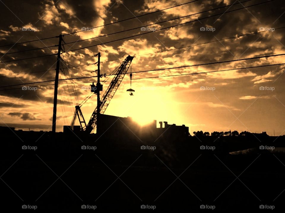 Holding up the Sun by crane in Florida on a construction site