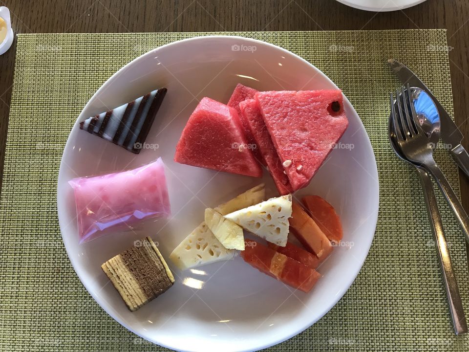 Indonesia desserts.  Yummy in Yogyakarta-some local traditional breakfast food.... combination of fruit and cakes 