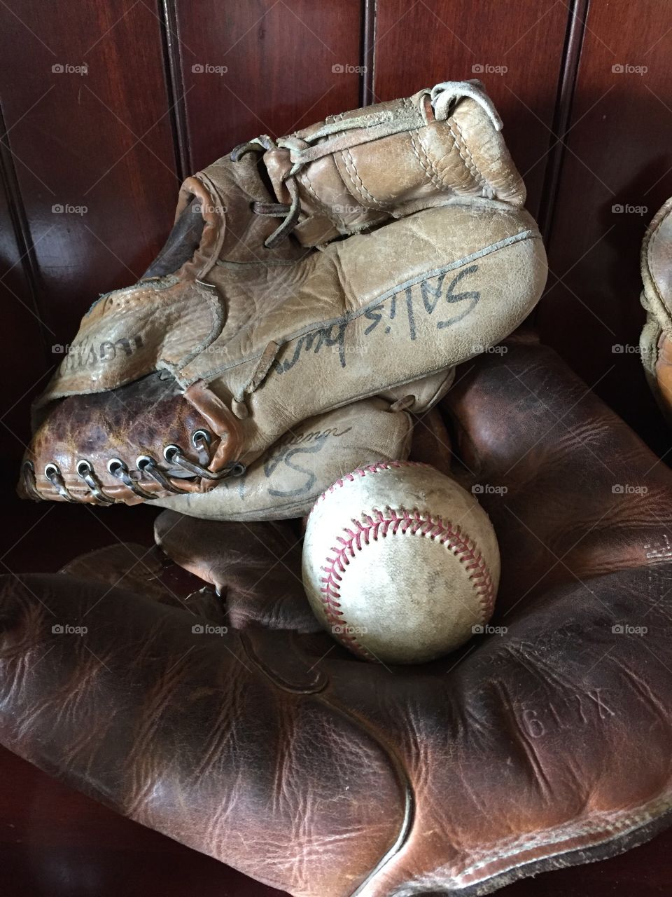 Antique Baseball Gloves and Ball