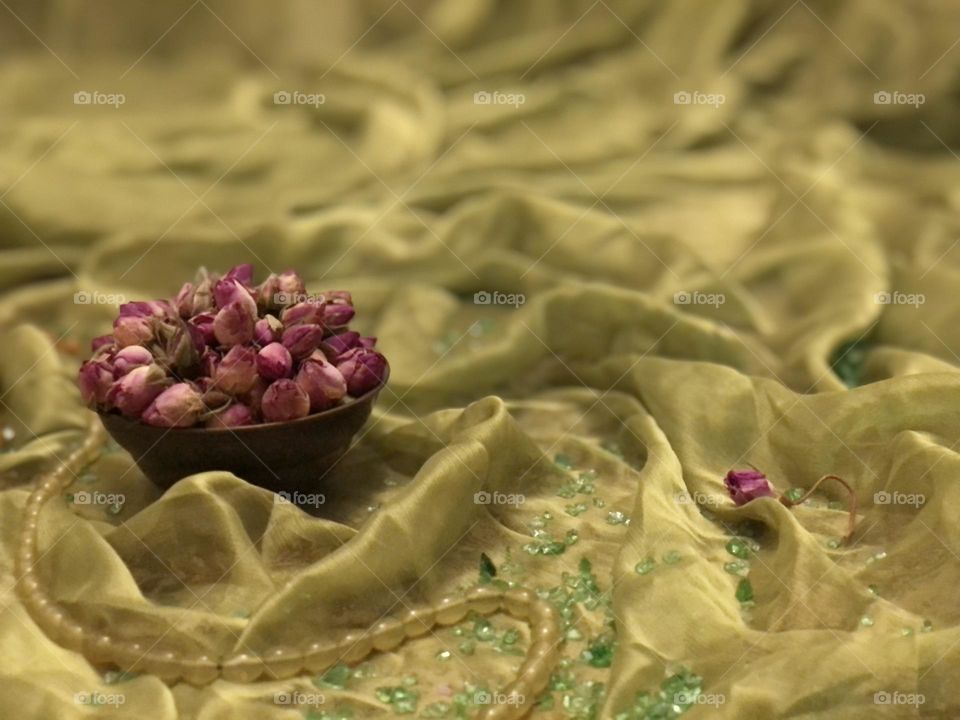 We were all fast sleep, and no one heard angels' footsteps when they brought us Damask roses.