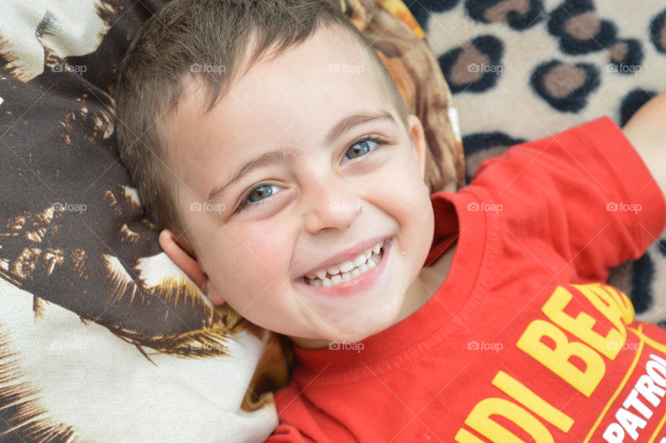 Close-up of a happy smiling boy