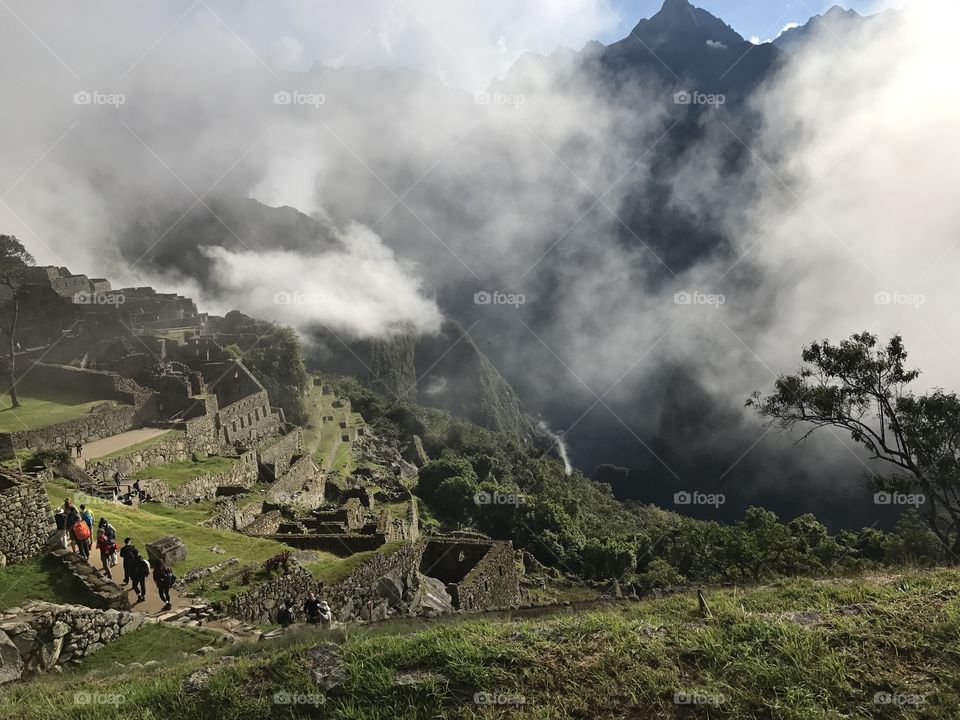 Scenic view of Machu Picchu at foggy weather