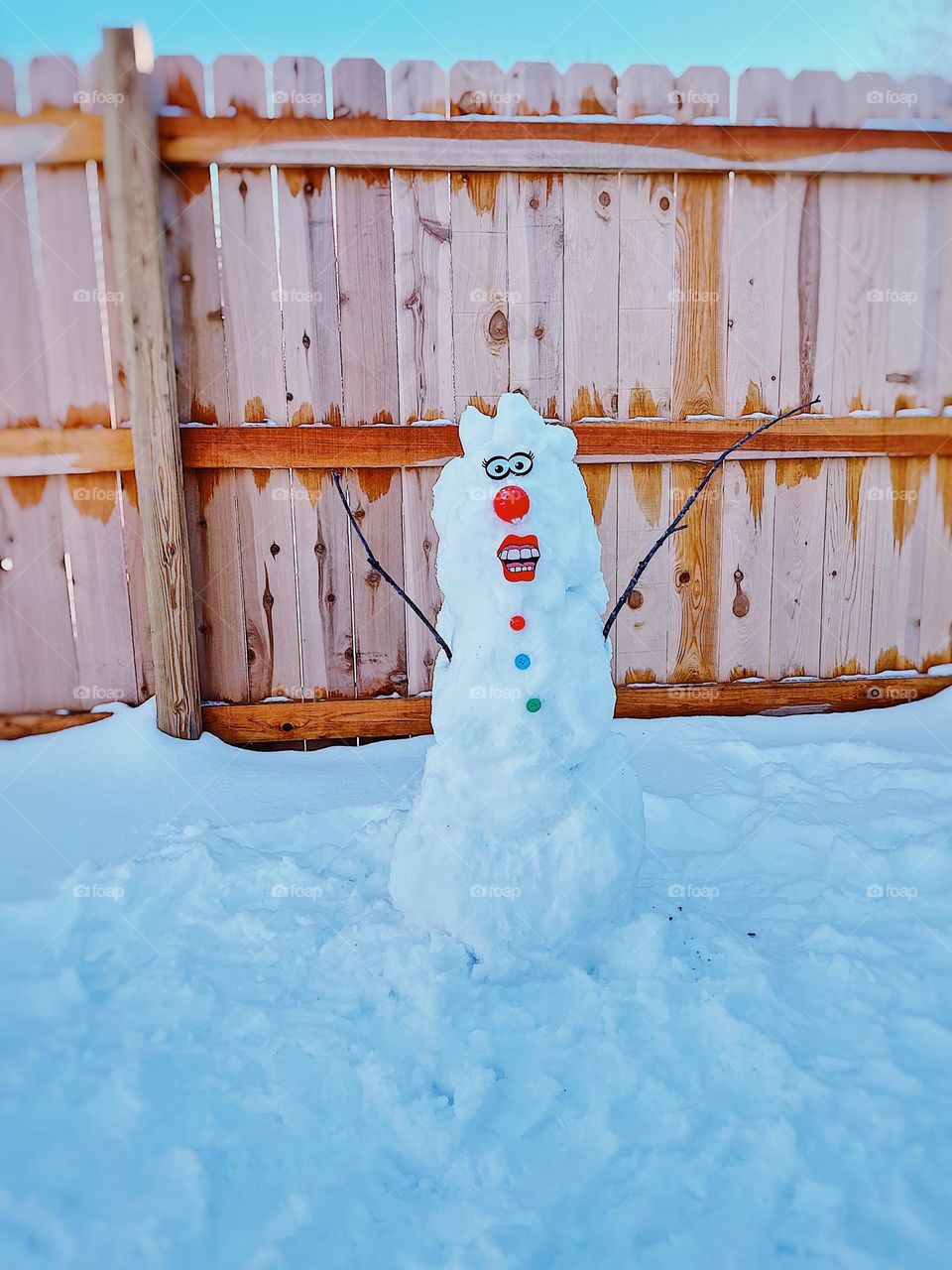 Building a snowman with a toddler, activities with kids in the snow, building snowmen in the Midwest, fun outdoor winter activities, snowmen in the winter 