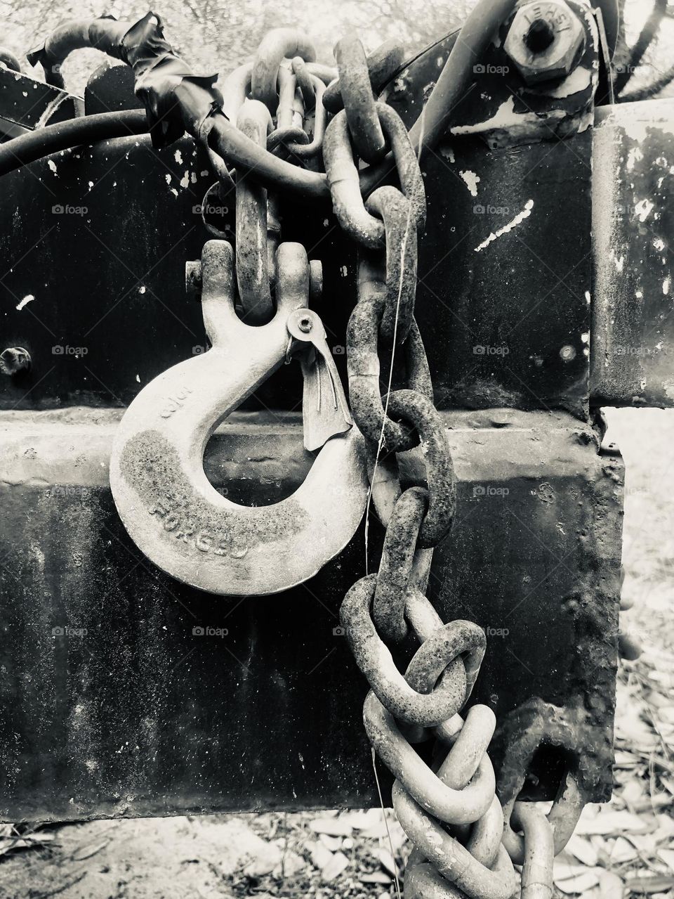 I can’t tell you how many trailer hitches or chains we have here on the ranch- but there’s a lot! Best in b&w!