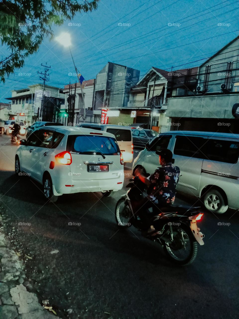 Night atmosphere on the city street, crowded