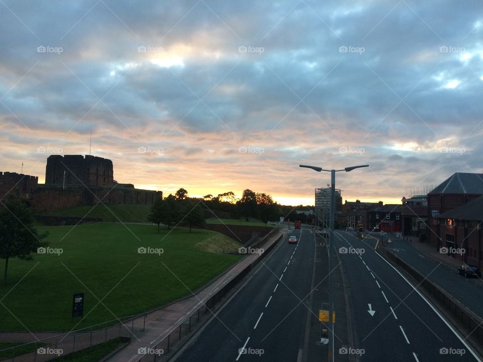 This is an image of Castle Way in Carlisle. I was having a walk at 5 in the morning due to my insomnia and found myself walking across the bridge on Castle Way. I looked at the colour of the sky behind the Castle and decided I could not miss this shot.
