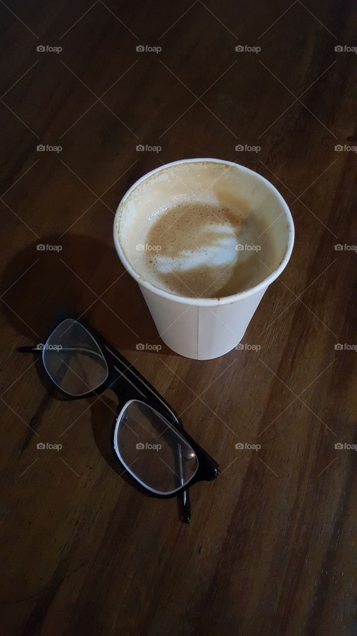 A cup coffee on the table