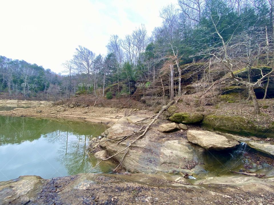 Mountain rock wall along shores of Green River Kentucky 