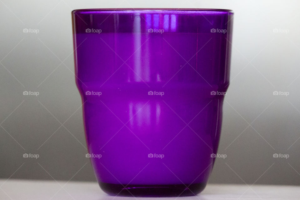 Purple glass with milk