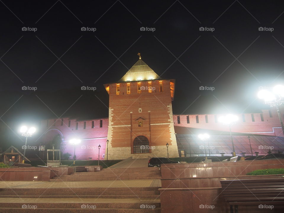 Night illumination of the tower and walls of the Nizhny Novgorod Kremlin.