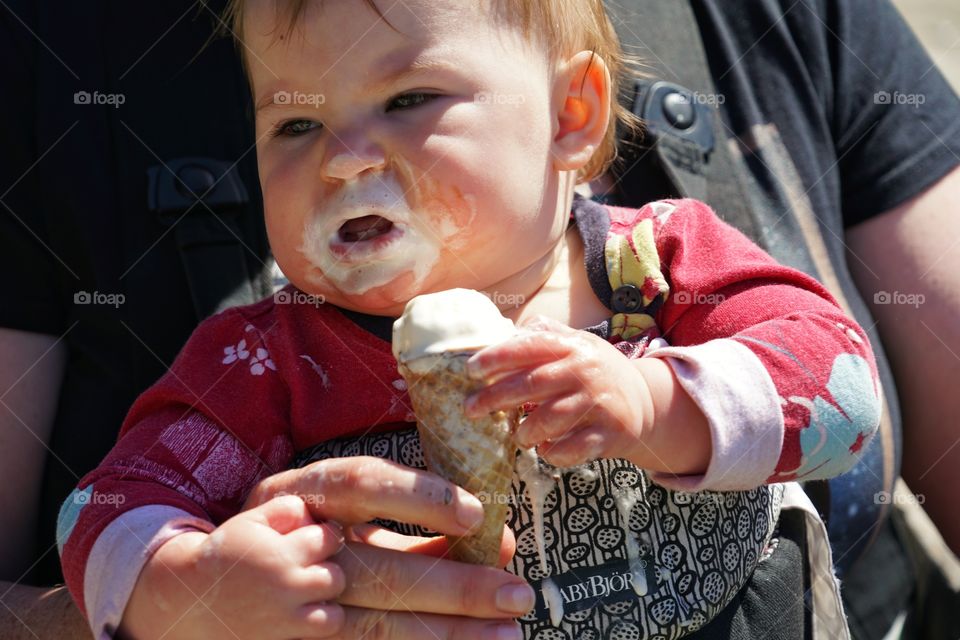 Baby Girl Eating Messy Ice Cream Cone