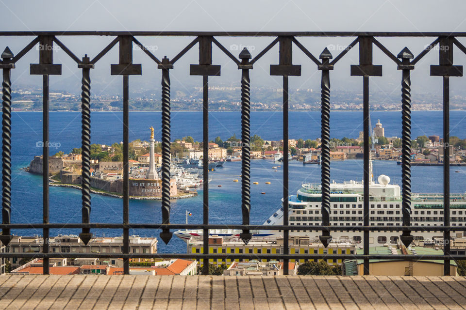 Messina behind the railing