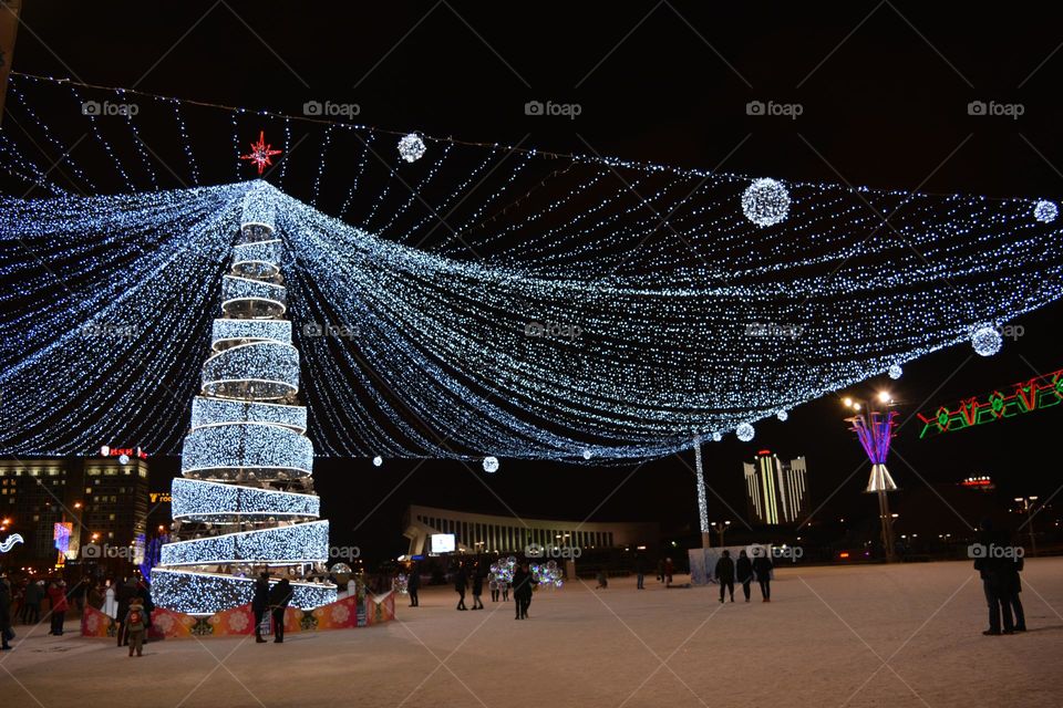 Christmas and New year holiday night light city Christmas tree