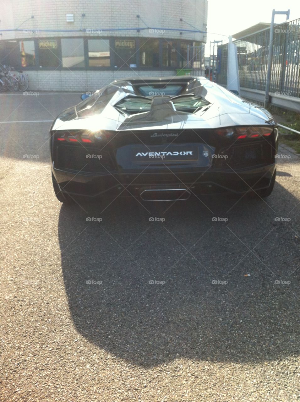 Black Lamborghini Aventador at circuit Zandvoort 