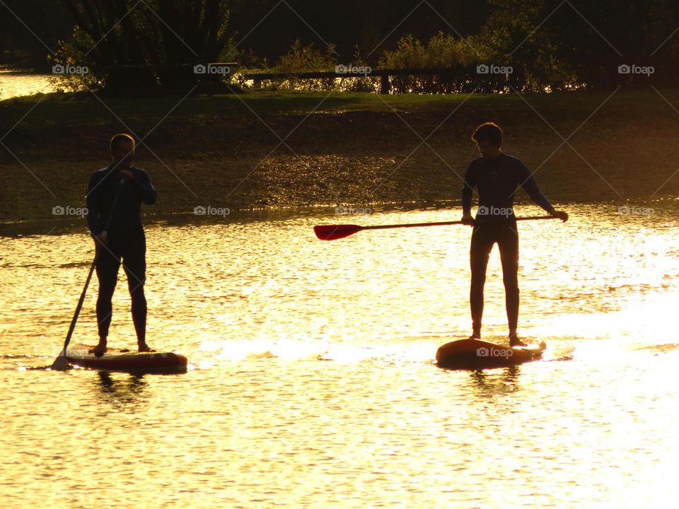 paddling in the sunset