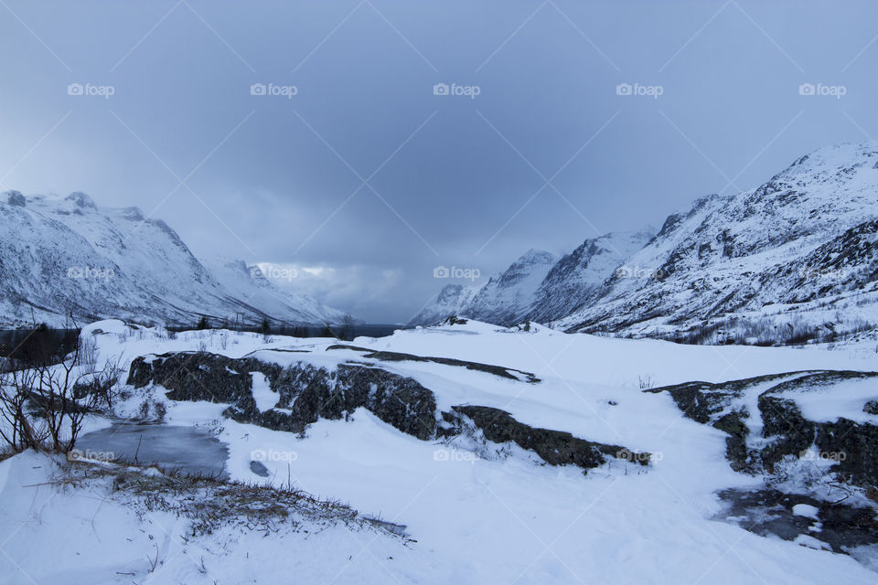 Blue light hours in the mountains of northern Norway when the sun isn't rising above the horizon in the winter. Ersfjord, Kvaloya.