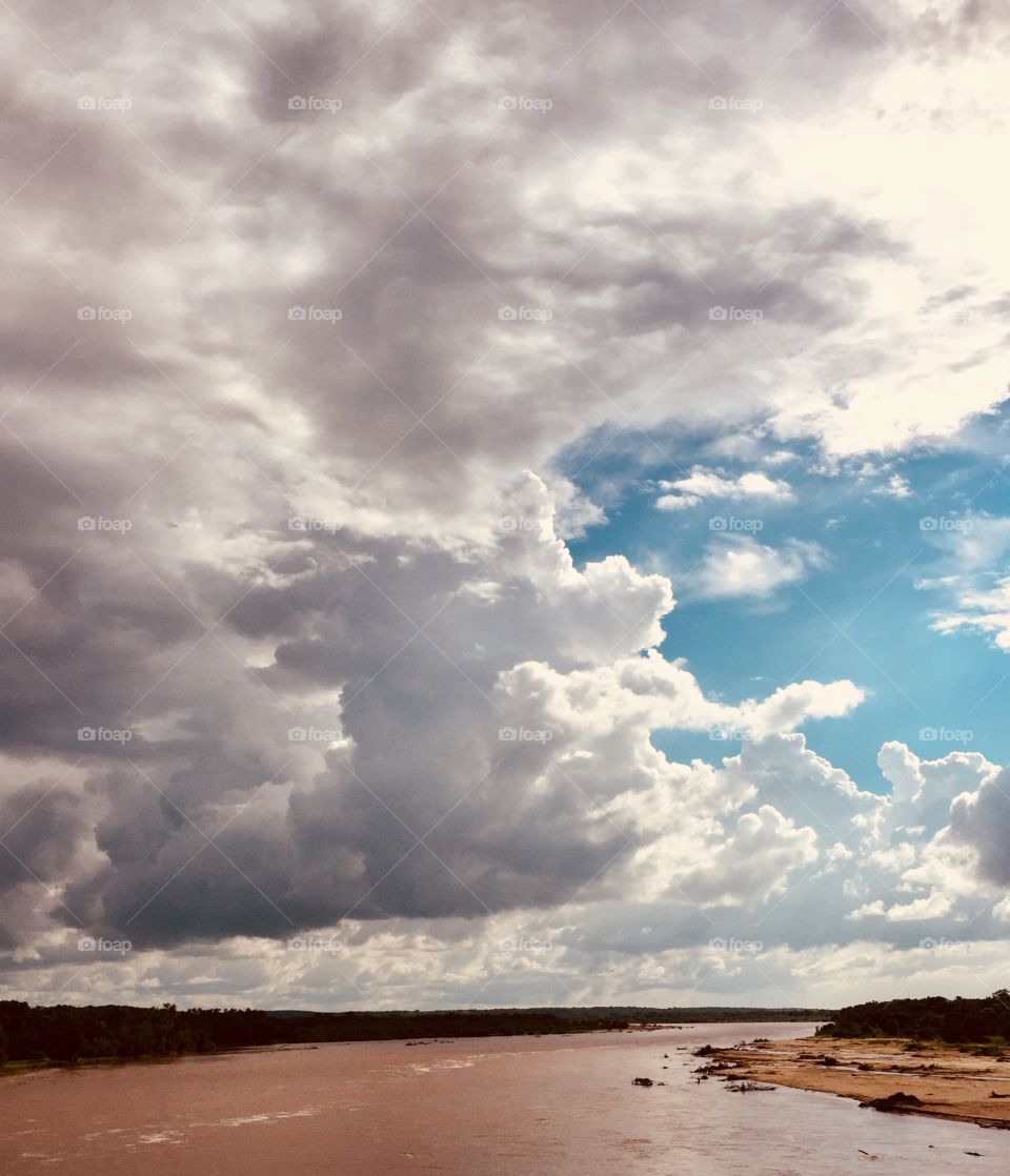 Storm Clouds over the Red River in the Spring