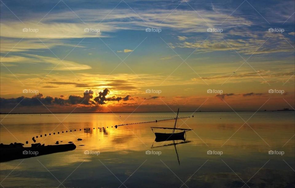 reflection sea water landscape sky sun sunset
