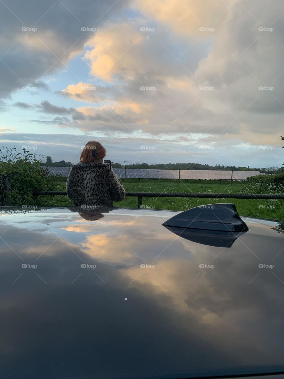 Girl captures a moment in time. Taken in south west England on iPhone camera. Spring evenings.