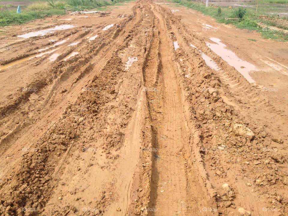 Muddy road in the face of heavy rain.