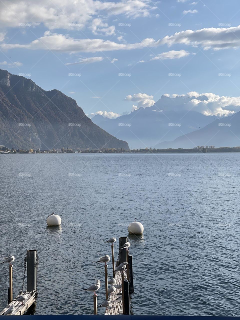 Swiss mountains landscape with Leman lake from Lausanne pier 