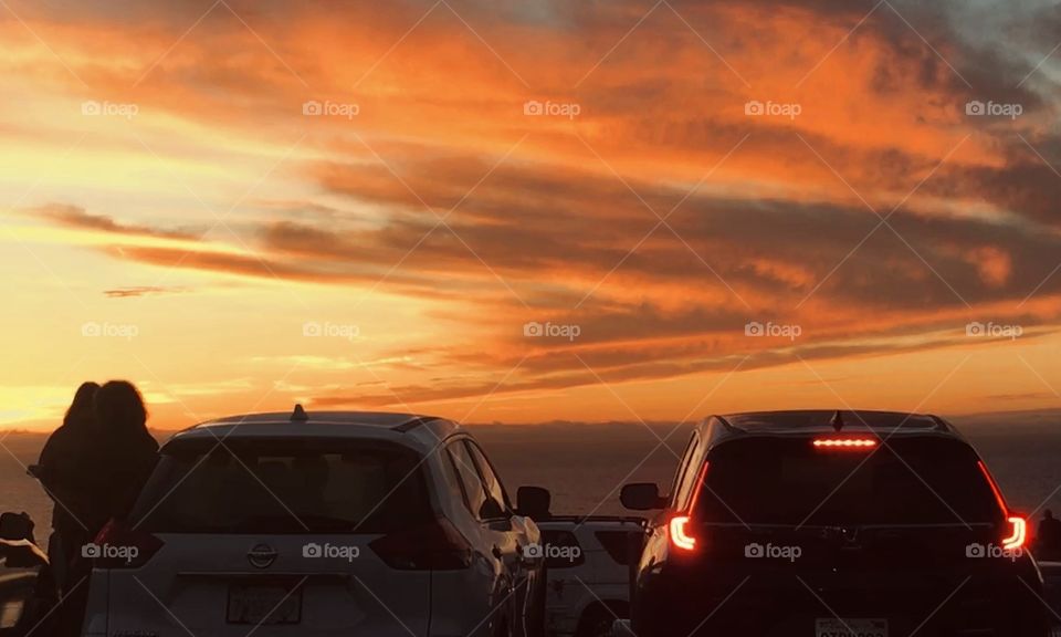Sunset at parking lot by the ocean