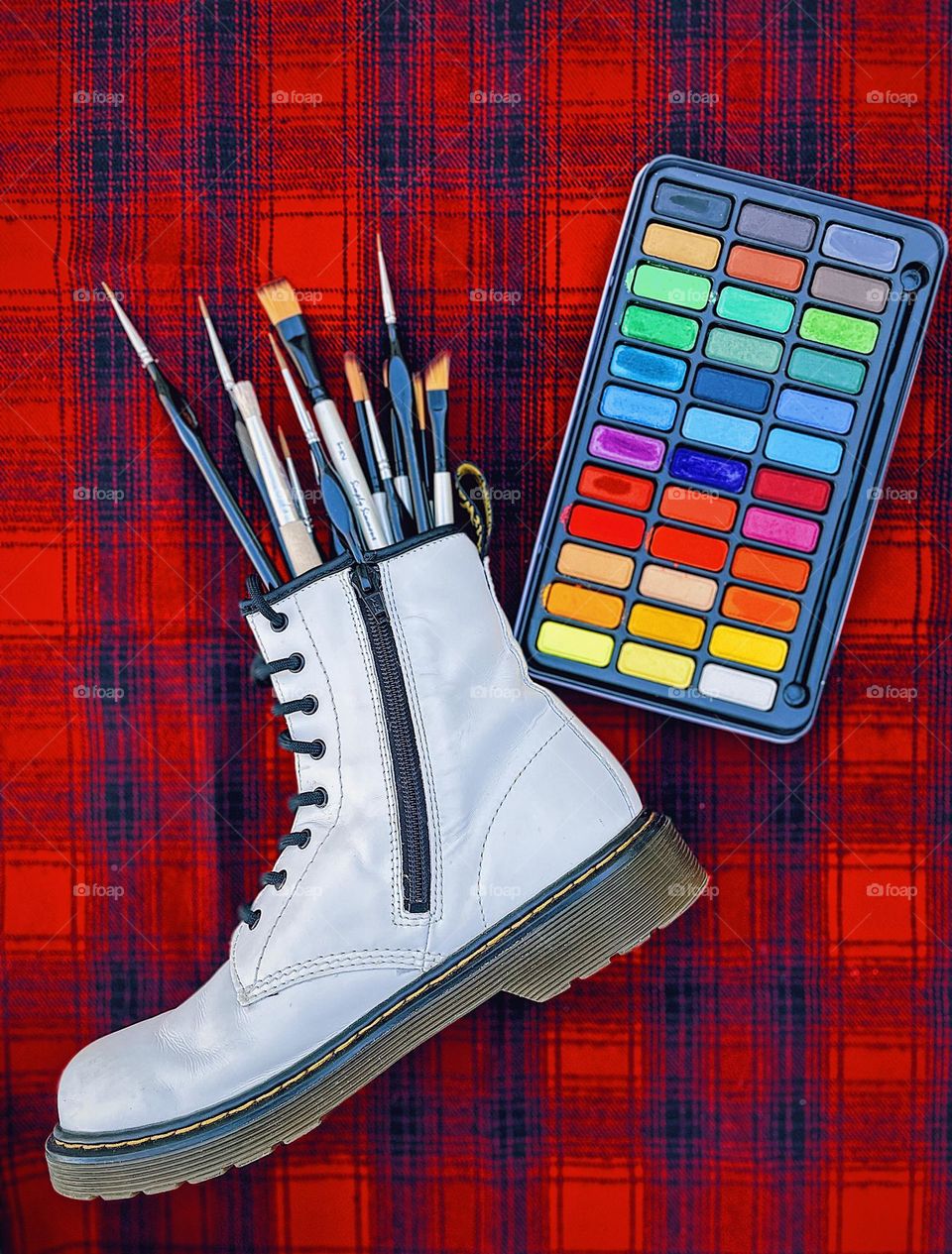 Artists wearing Doc Marten boots, getting creative with Dr. Marten boots, paints and DMs, art and boots, brushes and boots, Doc Marten white boots 