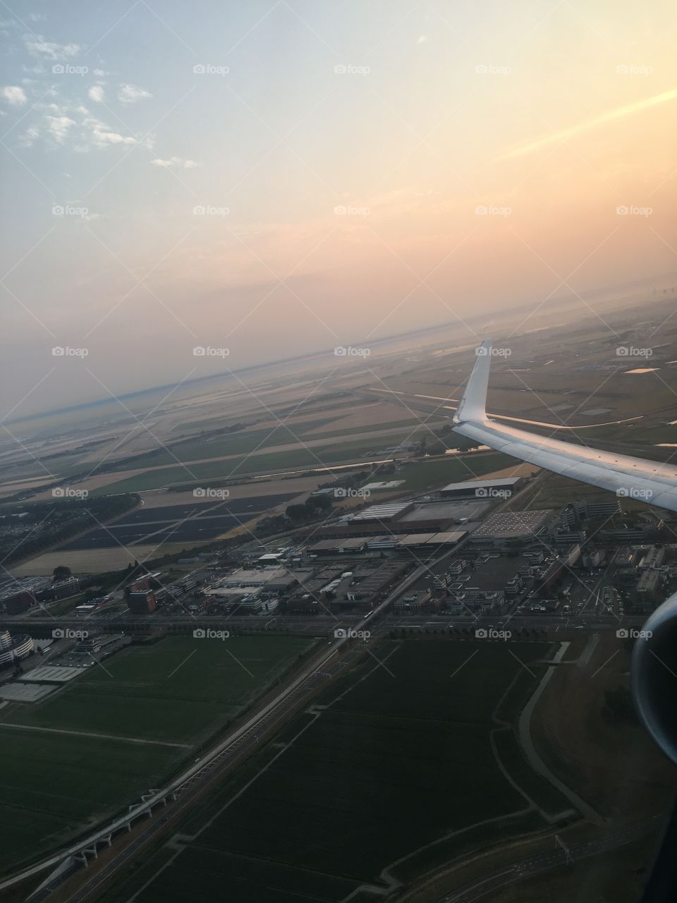 Taking off from Amsterdam Schiphol airport in the morning.