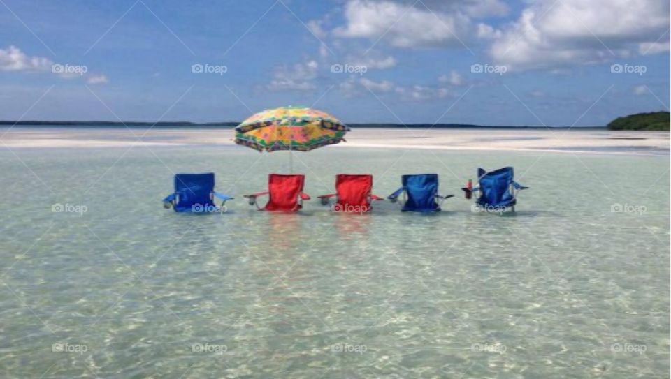 Beach chairs in the water