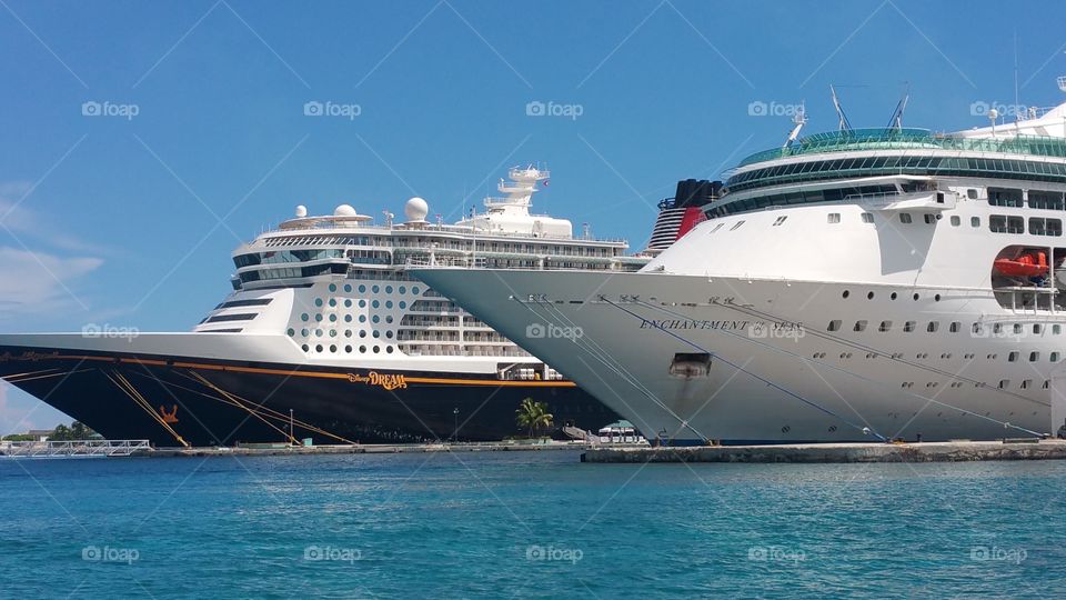 Front end of two Cruise ships Disney dream and Royal Caribbean enchantment of the seas🚢