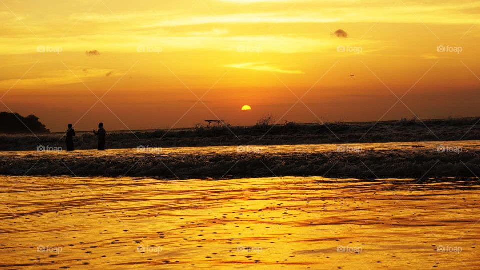 Oneday In Summer Sunset Goesdown at Jimbaran Beach - Bali
