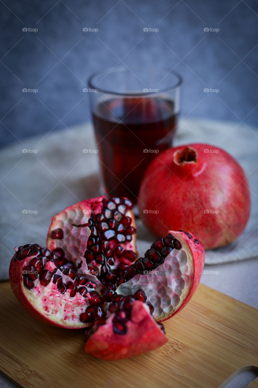 Cup of juice and pomegranate 