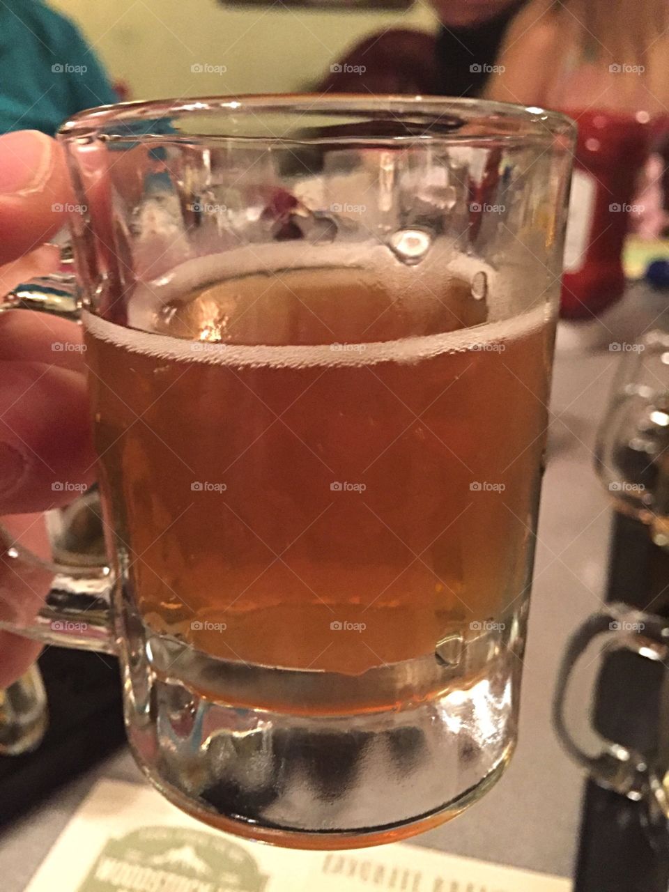 Sampler glass of beer.