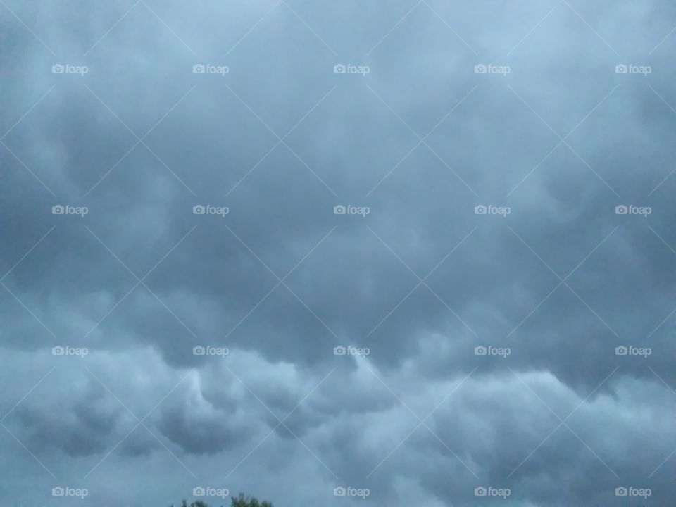 Storm clouds: date: 6/26/18 at 6:10 a.m. Type: image/jpeg Resolution: 2560x1920. Orientation: 0°. size: 781KB maker: LG Electronics. Flash/off. Focal length: 2.14 mm. White balance: auto. Aperture: 2.4 exposure time: 1/13.