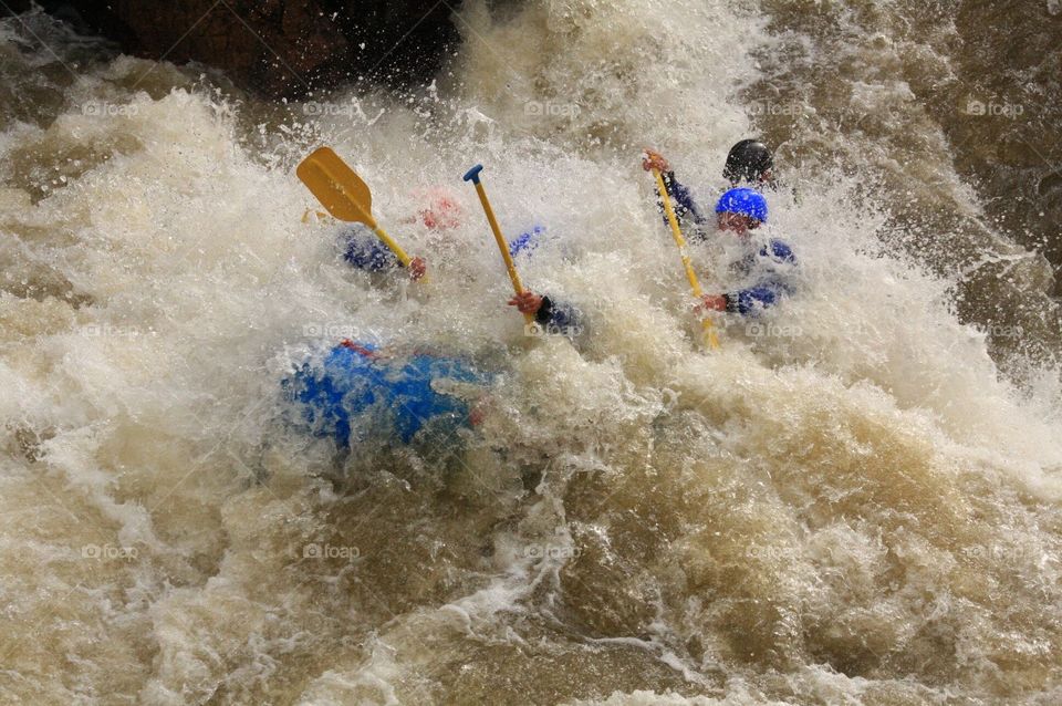 A shot from my last little whitewater trip in Colorado on Clear Creek. I am the only one with a red helmet and when this shot was taken, I was actually pulling the guy to my left back in the boat. Level 5 and 6 rapids in fresh snowmelt water that was 34° and took your breath everytime it hit you. Good times.