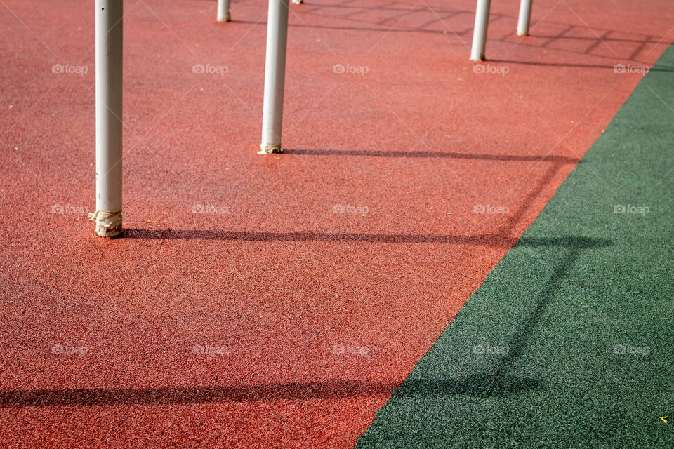 Playground.  Shadow, texture.